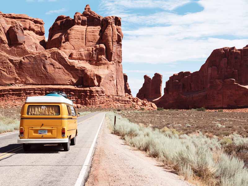 Taking a small shuttle from Las Vegas to the Grand Canyon along a desert road