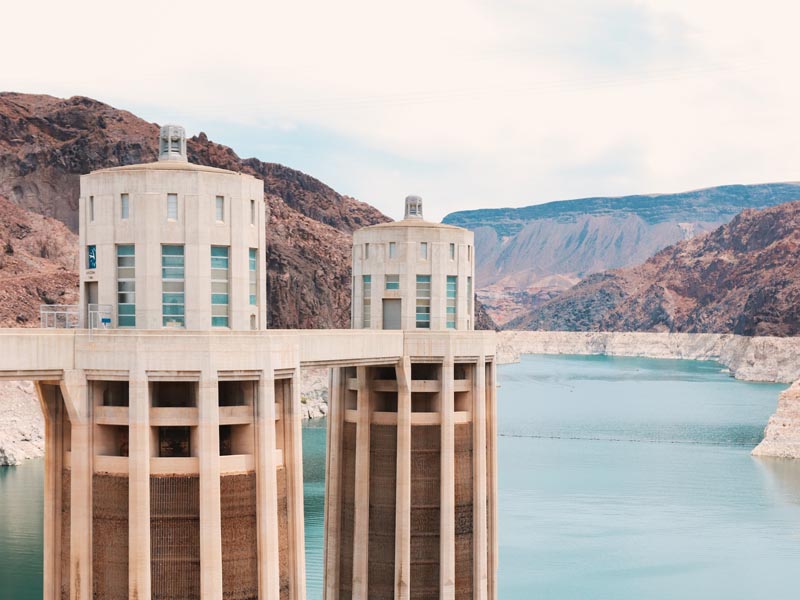 A close up view of two tall structures at the Hoover Dam