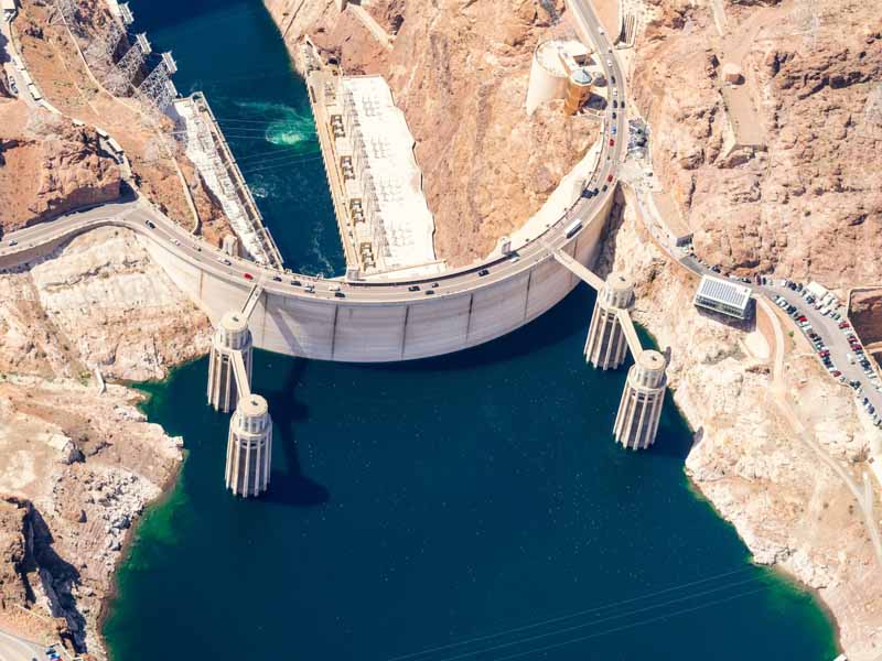 An aerial view of the Hoover Dam, Lake Mead, and Colorado River