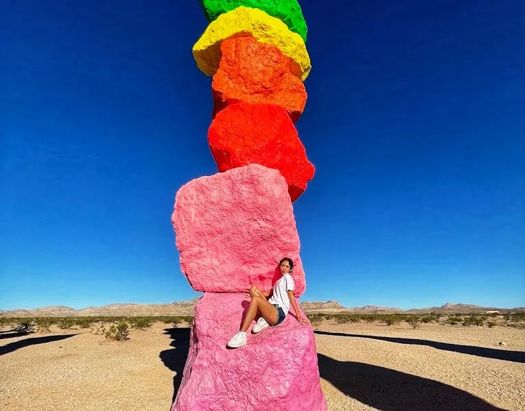 Woman Sitting On Seven Magic Mountains