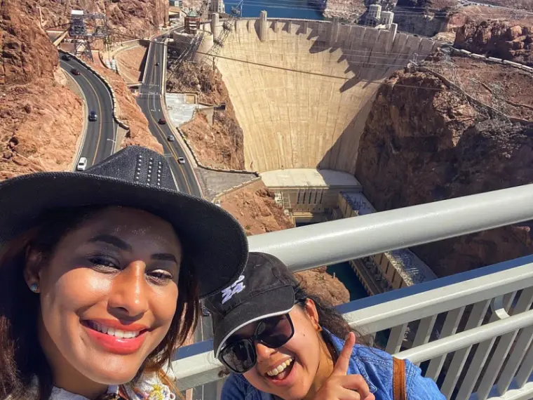 Two Ladies Posing in front of the Hoover Dam